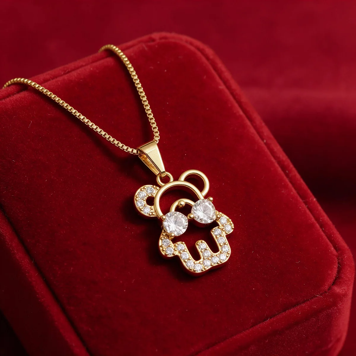 Cadena de oro goldfilled 18K con dije osito con lentes de circones
